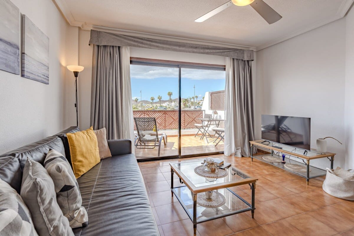 Living Room with Sitting Area, TV, Ceiling Fan & Views
