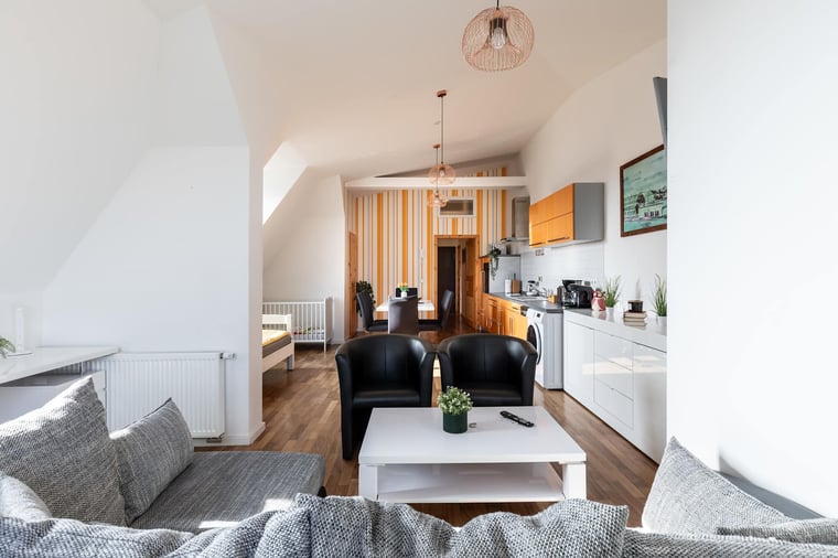 Living Area with Sofa-Bed, Armchairs, TV & Work Station 