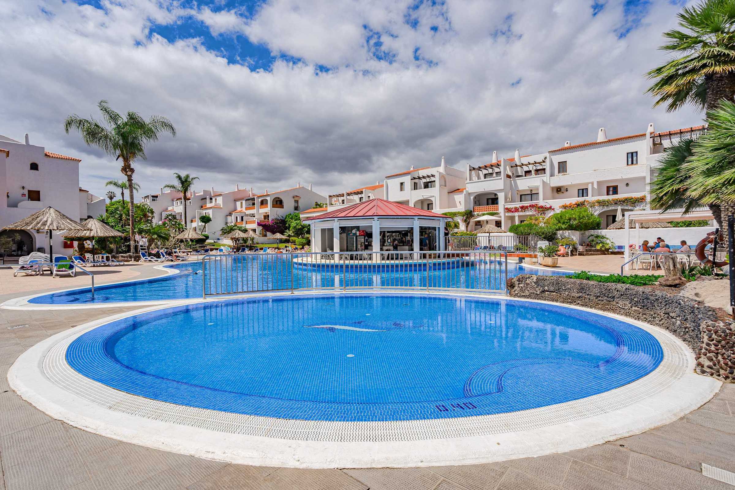 Resort Pool with Swim-Up Bar & Sun Loungers — A Dreamy Place to Soak, Sip, and Enjoy the Canary Island Sun