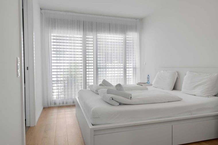 Peaceful Bedroom with Natural Light — Recharge Comfortably for Long-Term Stays in Vienna