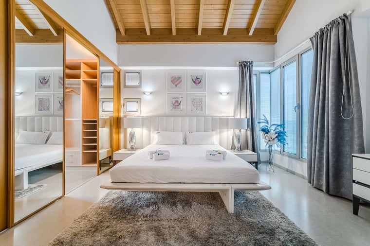 Master Bedroom Retreat with Walk-In Closet and Ambient Lighting - Rest and Recharge in This Bright and Airy Designer Suite