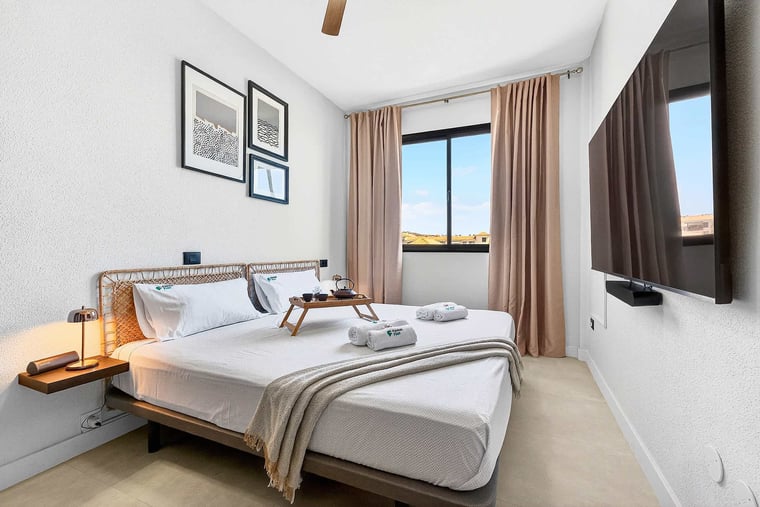 Master Bedroom with a King-Size Bed, Ocean Views, Wardrobes, En-Suite Bathroom and Multimedia TV & Sonos Sound System