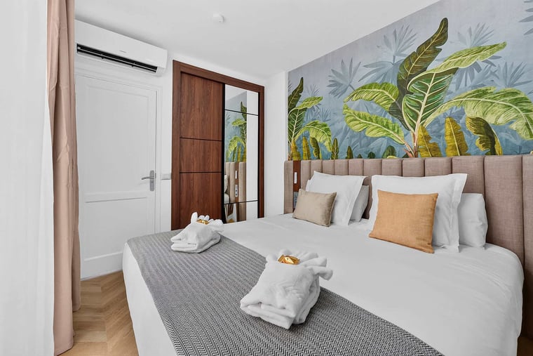 Serene Boutique Bedroom with Sophisticated Island-Inspired Interiors