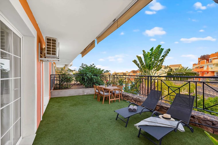 Spacious Private Terrace with Outdoor Dining and Relaxation Area