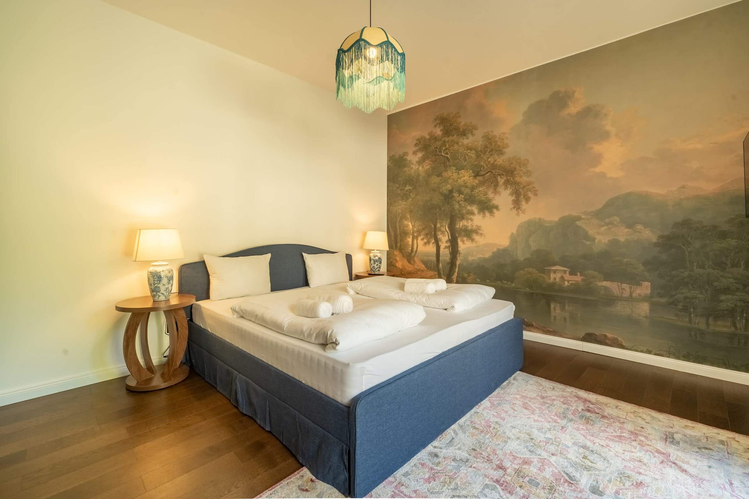 Bedroom 1 with landscape mural