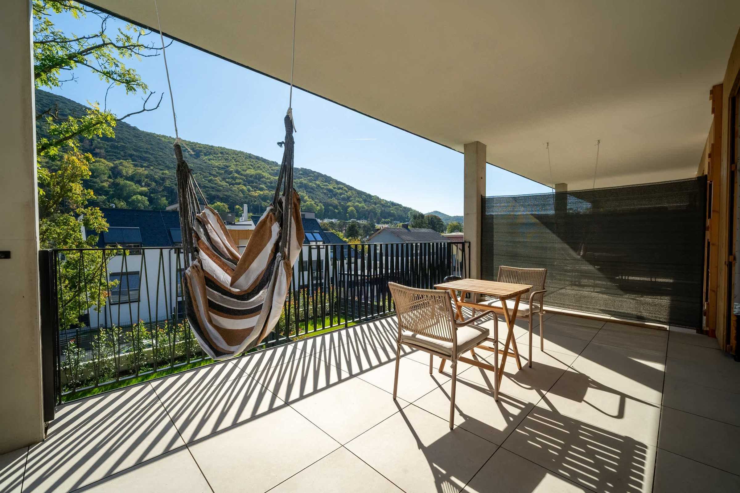 Balcony with hanging chair