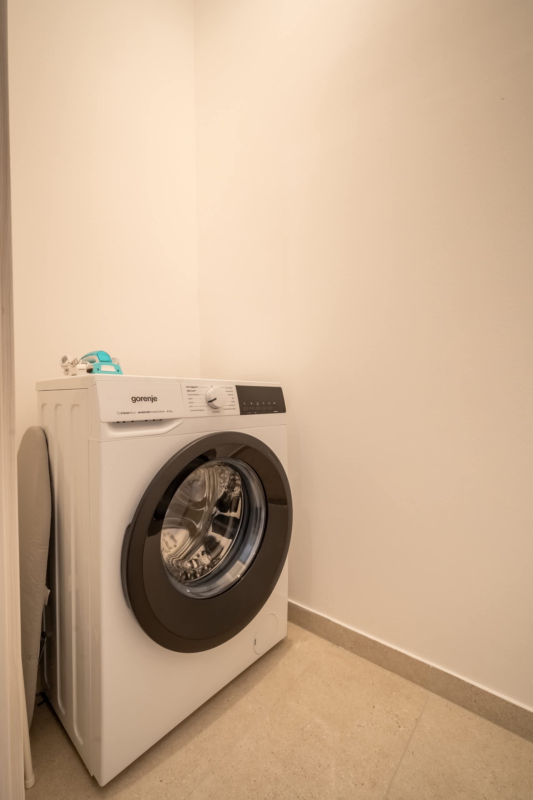 Utility room with washing machine
