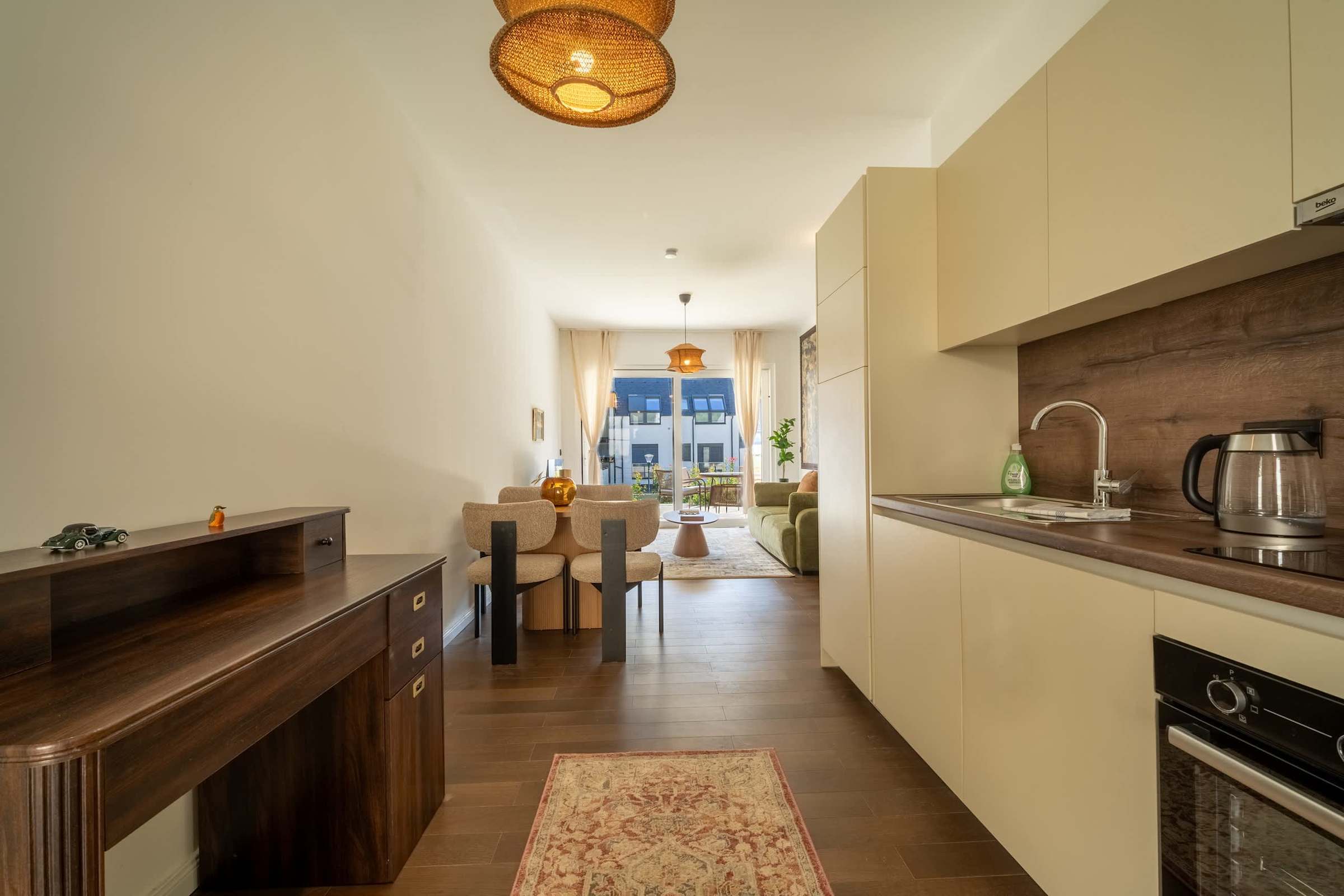 Kitchen, writing desk and dining area