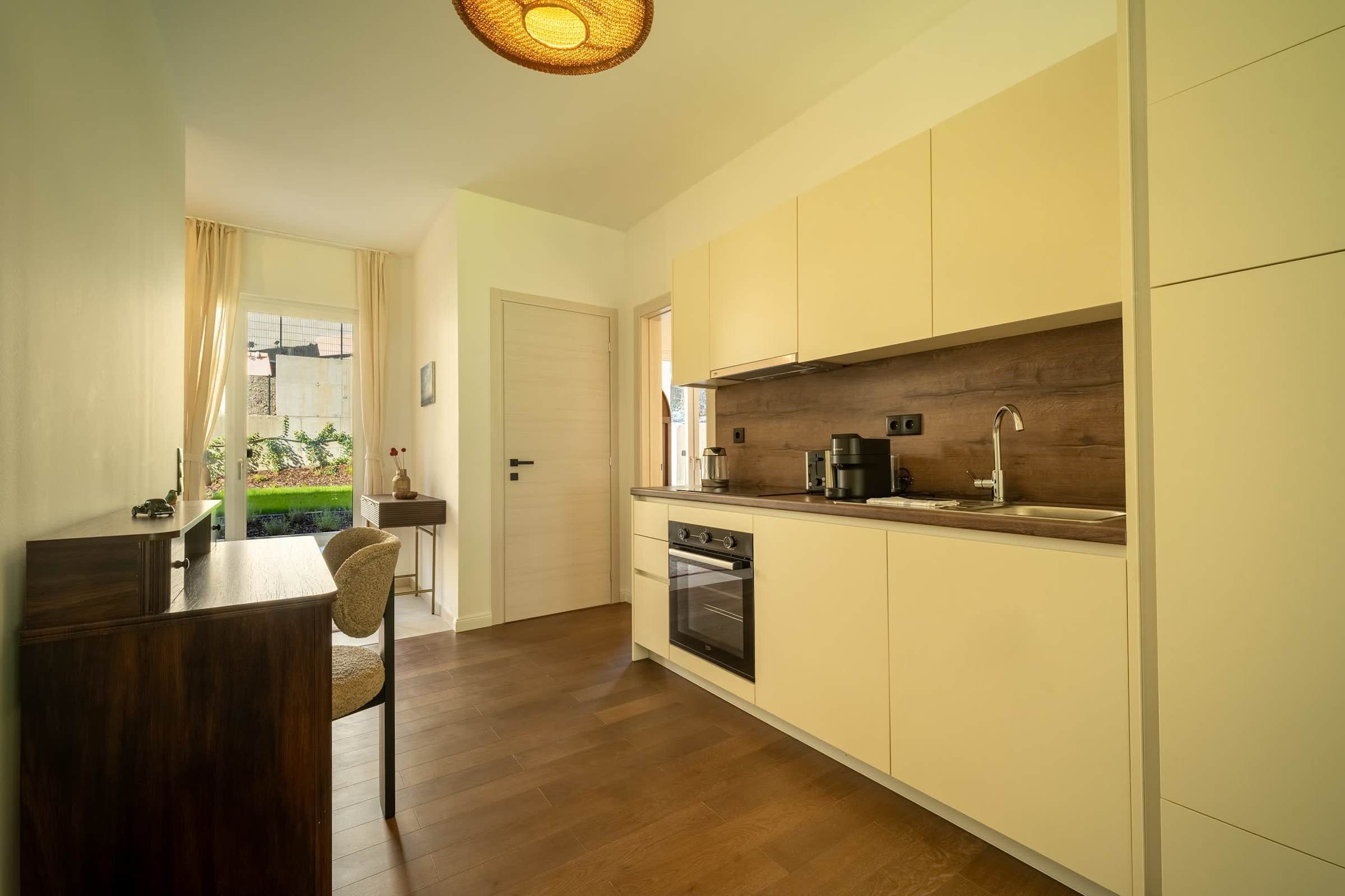 Fully equipped kitchen with a writing desk alongside
